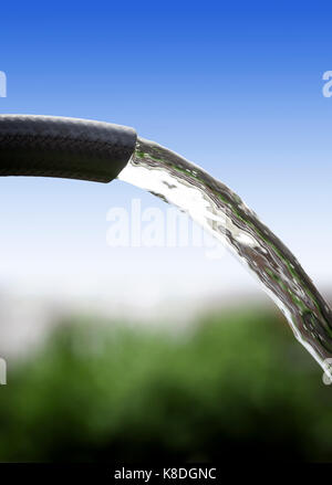 Breathtaking Water Flowing Through A Garden Hose Of Diameter 2.74 Cm Photo Illustration Breathtaking Water Flowing Through A Garden Hose Of Diameter 2.74 Cm Photo Illustration