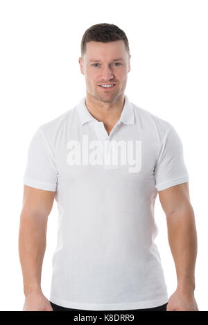 Portrait of confident man in casuals standing against white background Stock Photo