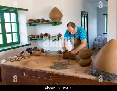 Potter at work, Museum and folklore arts centre, Casa Museo Monumento al Campesino, Lanzarote, Canary Islands, Spain Stock Photo