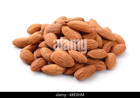 Heap of almonds isolated on white Stock Photo