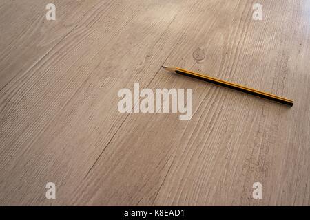 Pen on parquet. Stock Photo