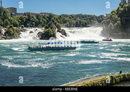 Rhine Falls of Schaffhausen, in front excursion boats, Neuhausen am Rheinfall, Schaffhausen, Switzerland Stock Photo