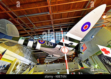 Portland Dorset Castletown WWII D-Day Centre British Supermarine Spitfire with D-Day stripes Stock Photo