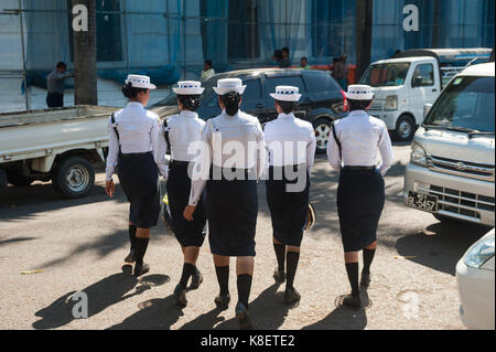 27.01.2017, Yangon, Yangon Region, Republic of the Union of Myanmar, Asia - A group of female traffic police officers walks along the side of a road.