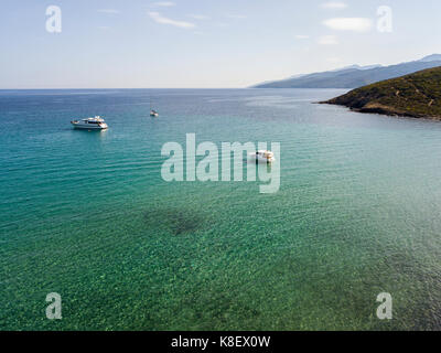 Aerial view of sailboats and boats moored in a bay on the Peninsula of Cap Corse, Corsica. Coastline. France Stock Photo