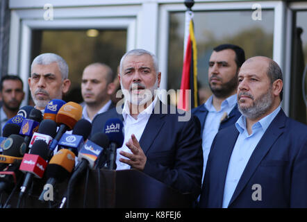 Rafah, Gaza Strip, Palestinian Territory. 19th Sep, 2017. Hamas Chief Ismail Haniyeh speaks to the press upon his arrival on the Palestinian side of the Rafah border crossing, in the southern Gaza Strip on September 19, 2017. Haniyeh said on Tuesday evening that his movement is ready to receive the Palestinian Unity Government in Gaza during a press conference held immediately after returning to the Gaza Strip from Cairo, he said: 'To show Hamas' seriousness to bring about reconciliation, we invite the unity government to come and assume its duties in Gaza unimpeded (Credit Image: © Stock Photo