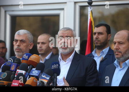 Gaza. 19th Sep, 2017. Hamas Chief Ismail Haniyeh (C) speaks during a news conference on his return from Egypt at Rafah border crossing in the southern Gaza Strip, Sept. 19, 2017. Haniyeh said on Tuesday that it is ready to resume dialogue with Fatah movement. Credit: Khaled Omar/Xinhua/Alamy Live News Stock Photo