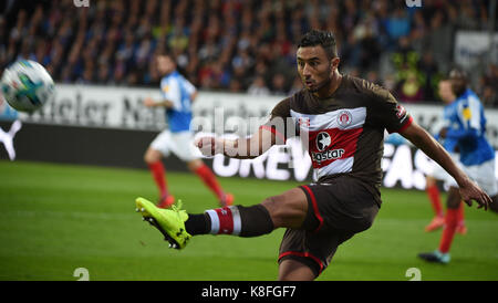 Kiel, Germany. 19th Sep, 2017. Pauli's Aziz Bouhaddouz in action during the German Second Bundesliga soccer match between Holstein Kiel and FC St. Pauli in the Holstein-Stadion in Kiel, Germany, 19 September 2017. (EMBARGO CONDITIONS - ATTENTION: Due to the accreditation guidelines, the DFL only permits the publication and utilisation of up to 15 pictures per match on the internet and in online media during the match.) Credit: Axel Heimken/dpa/Alamy Live News