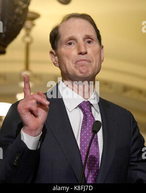 United States Senator Ron Wyden (Democrat of Oregon) speaks to reporters outside the US Senate Chamber following the Democrats' weekly luncheon caucus in the US Capitol in Washington, DC on Tuesday, September 19, 2017. The Democratic leadership is advocating against the passage of the Graham-Cassidy Act that would replace parts of the Affordable Care Act (also known as ObamaCare) with block grants for the individual states. Credit: Ron Sachs/CNP /MediaPunch Stock Photo