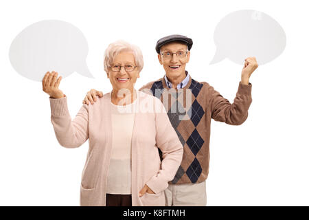 Seniors with speech bubbles looking at the camera and smiling isolated on white background Stock Photo