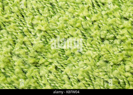 Close up of green yarn carpet for background Stock Photo