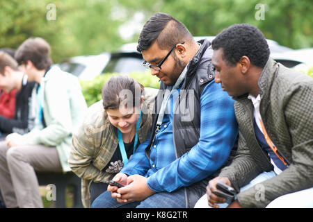Students at vocational school taking break Stock Photo