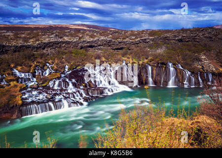 Hraunfossar, a series of waterfalls pouring into Hvita River, Borgarfjordur, Western Iceland Stock Photo