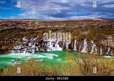 Hraunfossar, a series of waterfalls pouring into Hvita River, Borgarfjordur, Western Iceland Stock Photo