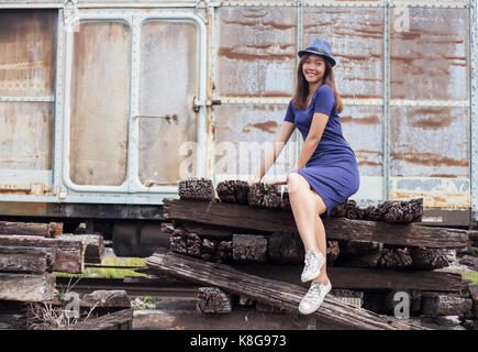 asian thai lady model post action tourism old train in dark clound concept Stock Photo