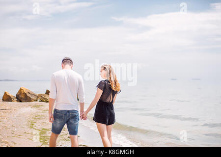 Couple on beach, Odessa, Ukraine Stock Photo