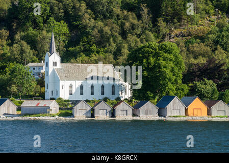 boathouses and church in the bay of Selje on peninsula Stadlandet, Norway, Scandinavia, Europe. Stock Photo
