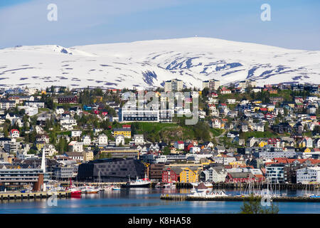 View across harbour to old city buildings on Tromsoya island in summer. Tromso, Troms, Norway, Scandinavia Stock Photo