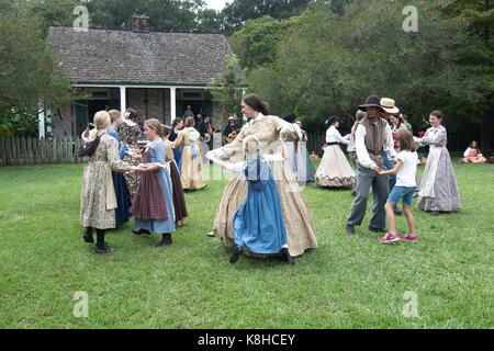 Baton Rouge, Louisiana, USA - 2016: Actors dancing at LSU Rural Life Museum, an outdoor museum of Louisiana history. Stock Photo