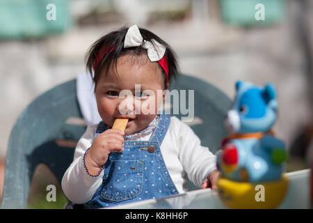 BABY EATING Stock Photo