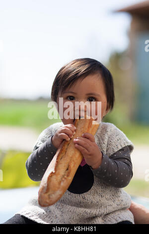 BABY EATING Stock Photo