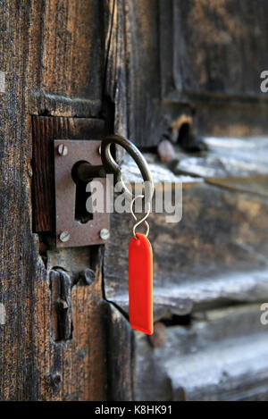 Bionnay baroque chapel. old door with key. france. Stock Photo