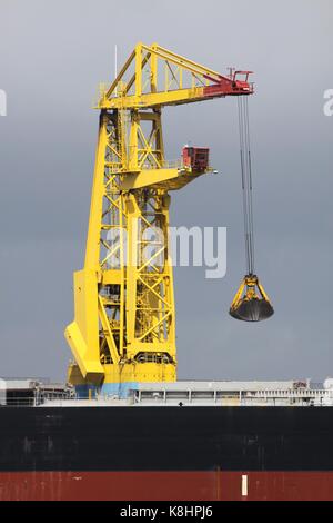 harbor crane at work Stock Photo