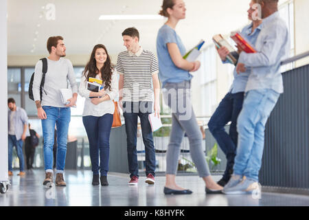 Students in university during class break have fun Stock Photo