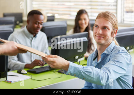 Young student learns in computer lessons at university Stock Photo