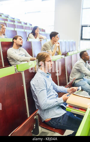 Students in university lecture learn together Stock Photo