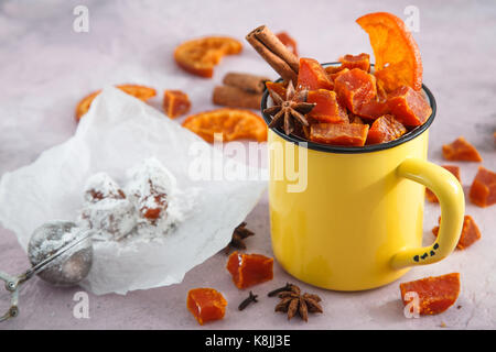 Fruits candy - halloween sweets in yellow cup. Stock Photo
