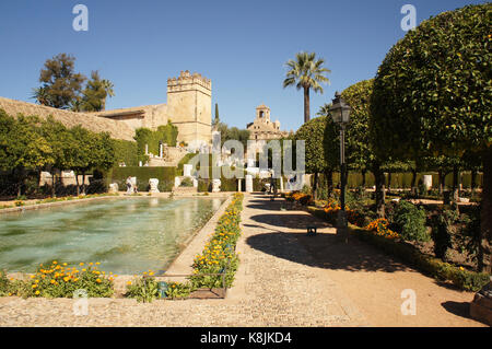 Panorama of Alcazar in Cordoba, Spain with palms fountains and tower Stock Photo