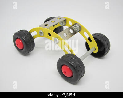 steel toy car on a white background (education toys) (selective focus) Stock Photo