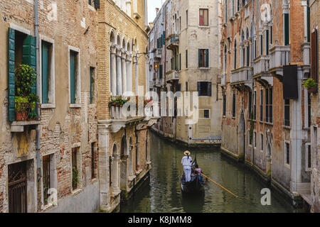 Venice Gondola boat in Canal, Venice (Venezia), Italy Stock Photo