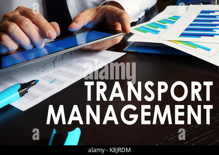 Transport management concept. Man is holding tablet. Stock Photo