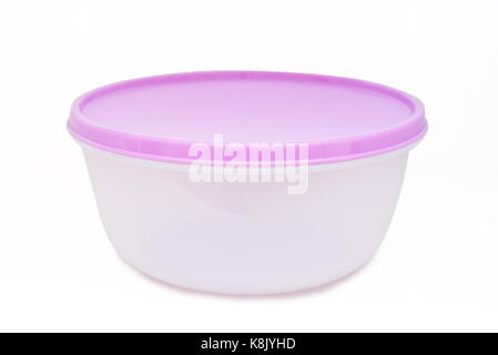 Plastic food container with pink lid isolated Stock Photo