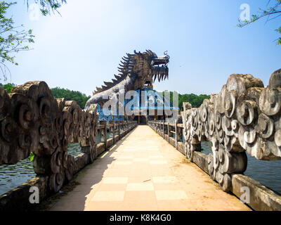 Hue, Vietnam - September 13 2017: Huge dragon in aquarium building in abandoned water park in Hue, Vietnam. Dragon structure Stock Photo