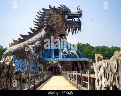 Hue, Vietnam - September 13 2017: Huge dragon in aquarium building in abandoned water park in Hue, Vietnam. Dragon structure Stock Photo