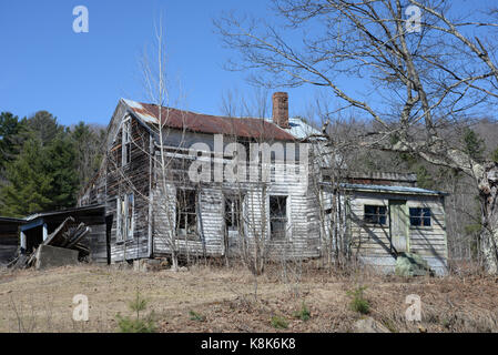 Old abandoned run down falling down house in the country. Stock Photo