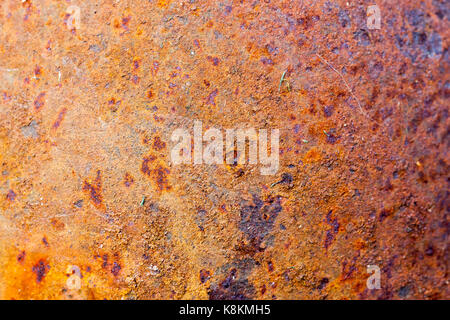 oxidized metal surface from the interaction of iron with water and oxygen. Photo close-up. Corrosion and rust on metal sheet Stock Photo