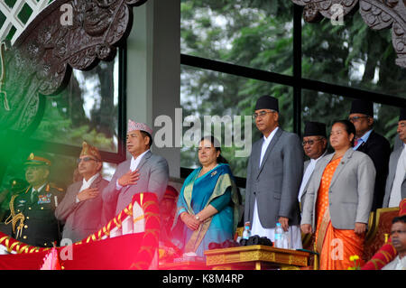 Kathmandu, Nepal. 19th Sep, 2017. (L-R) Chief of Army Staff General Rajendra Chhetri, Vice President of Nepal Nanda Kishor Pun, President Bidhya Devi Bhandari, Prime Minister of Nepal Sher Bahadur Deuba and Constituent Assembly chairperson Onsari gharti Magar stand as the national anthem played during celebration of Nepalese Constitution Day at Nepal Army Pavilion, Tundikhel, Kathmandu, Nepal on Tuesday, September 19, 2017. Credit: Narayan Maharjan/Pacific Press/Alamy Live News Stock Photo