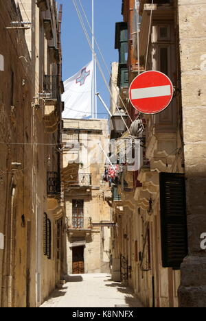 No entry sign in narrow street Birgu, Malta Stock Photo