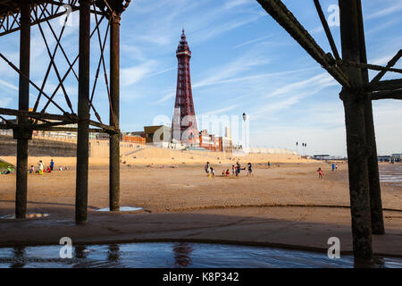 A view of Blackpool's famous tower from underneath the North Pier. Stock Photo