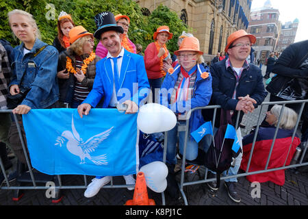 People wait for the appearance of Dutch King Willem-Alexander, Queen Maxima, Princess Laurentien and Prince Constantijn in front of Palace Noordeinde ahead of the Prinsjesdag on September 19, 2017, in The Hague, Netherlands. The Prinsjesdag is the opening-day of Dutch parliament and takes place annually on the third Tuesday of September. Credit: Yuriko Nakao/AFLO/Alamy Live News Stock Photo