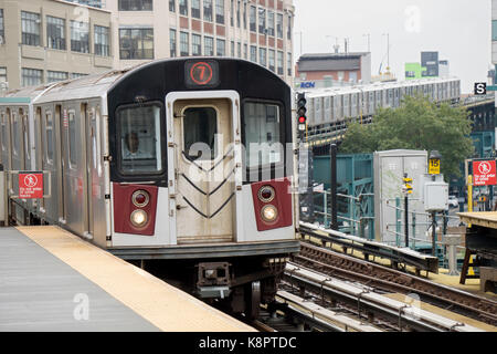 The Manhattan bound #7 elevated subway train pulling into the 45th Road-Courthouse Square station in Long Island City Hunter's Point, Queens, New York Stock Photo