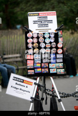 RESIST TRUMP buttons, fridge magnets and stickers for sale in Washington Square PArk in Greenwich Village, New York City. Stock Photo