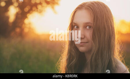 closeup portrait of teen girl in sunset Stock Photo