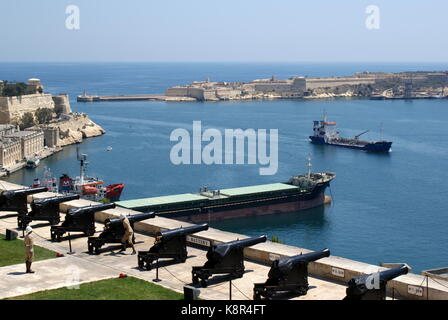 Preparing to fire the midday cannon at the Saluting Battery, Upper Barrakka Gardens, Valletta, Malta Stock Photo