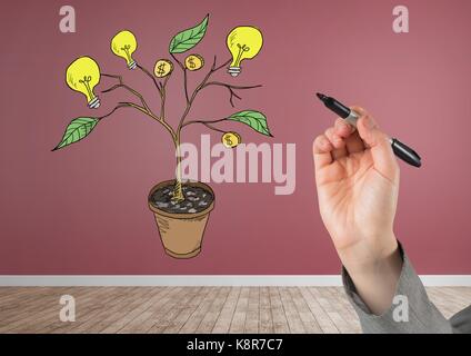 Digital composite of Hand holding pen and Drawing of Money and idea graphics on plant branches on wall Stock Photo