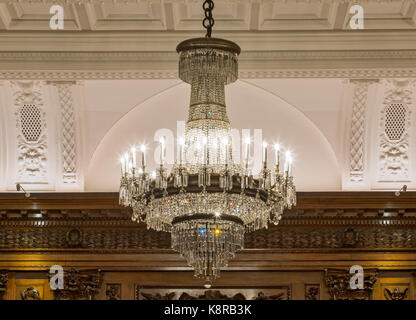 UN Ballroom chandelier detail. Ten Trinity Square - Four Seasons Hotel, City of London, United Kingdom. Architect: Aukett Swanke, 2017. Stock Photo
